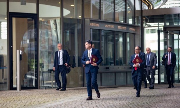 Chief Minister and Deputy Chief Minister exiting the EU Commission building 